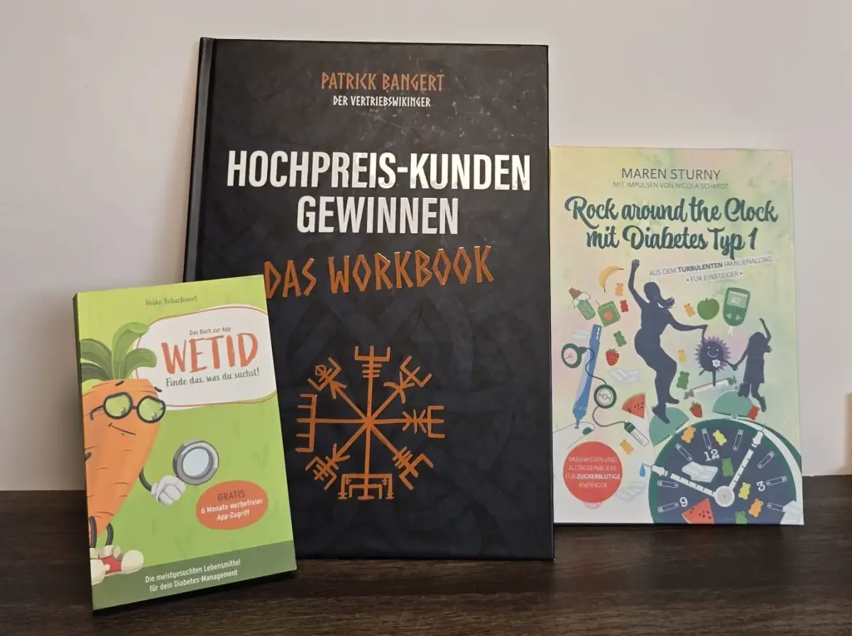 Drei Bücher, darunter 'Hochpreis-Kunden gewinnen', die zum Thema Empfehlungsgeschäft passen.