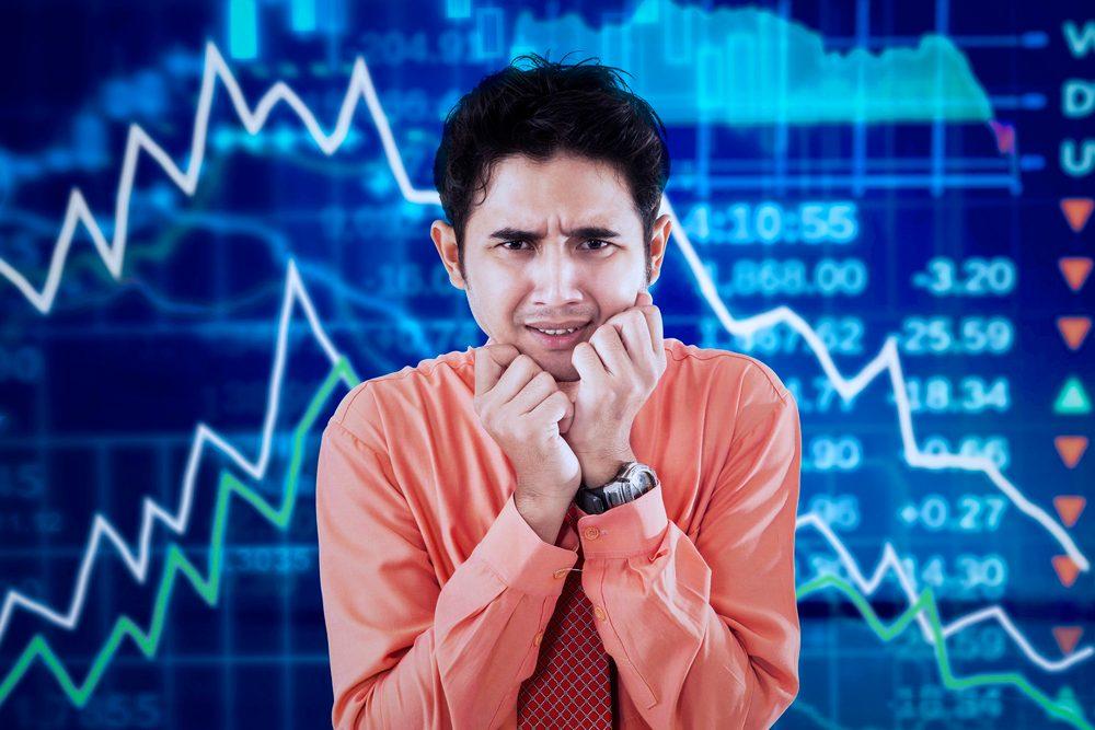 Trader zeigt Angst und Unsicherheit beim frühen Mitnehmen von Gewinnen.