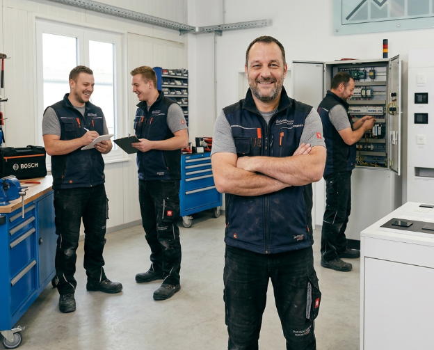 Ein Team von Handwerkern bei der Vorbereitung auf einen Unternehmensverkauf.