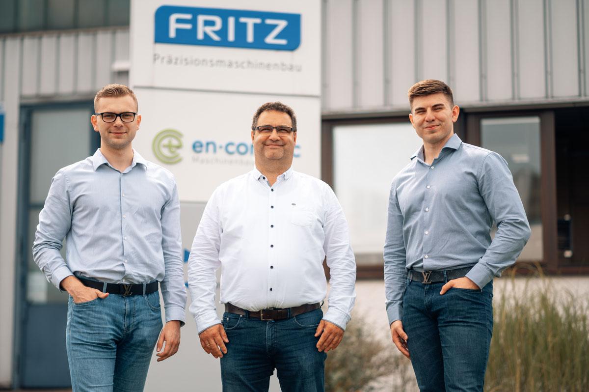 Anes Kavka und Robert Kirs mit einem Kunden